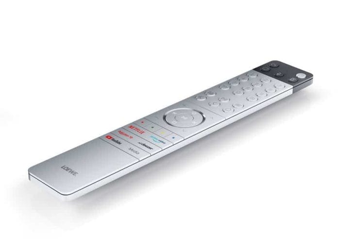 Die Loewe Fernbedienung des bild c mit Schnellwahltasten für diverse Streamingdienste und 10-Zahlen-Bedienfeld
